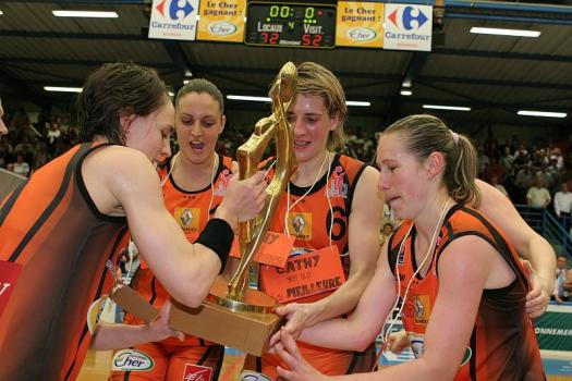 Céline Dumerc,Ana Lelas, Cathy Melain and Katarina Manic holding the LFB trophy for Bourges Basket 2009 LFB Champions © Olivier Martin
