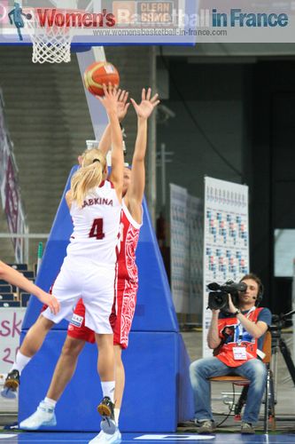 Elina Babkina shooting over a Russian