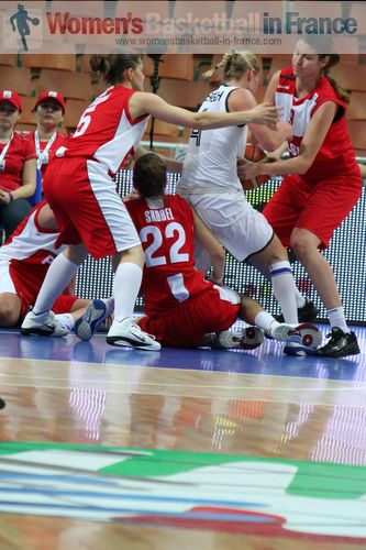 Players from Germany and Montenegro scramble for the ball