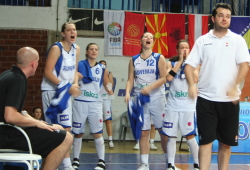 Slovenia U18 bench looking on